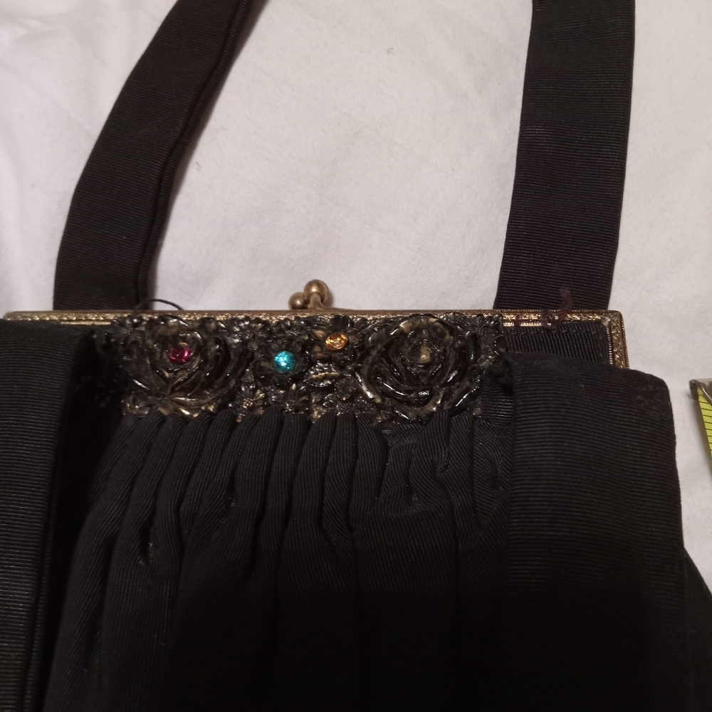 Vintage black clutch that is like new condition